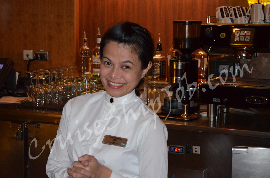 A nice photo of a female Bartender aboard Celebrity Cruises ships. Hired cruise job seekers photo album